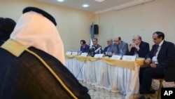 Members of Syrian opposition groups seen during a press conference after three-day meetings outside Istanbul, Turkey, October 31, 2012.