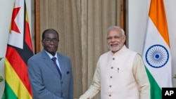 President Robert Mugabe with Indian Prime Minister Narendra Modi at the India Africa Summit.