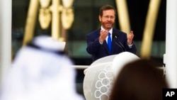Israeli President Isaac Herzog speaks at Expo 2020 in Dubai, United Arab Emirates, Jan. 31, 2022. The UAE intercepted a ballistic missile fired by Yemen's Houthi rebels early in the day.