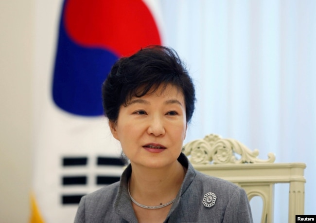 FILE - South Korean President Park Geun-hye speaks during an interview at the Presidential Blue House in Seoul Sept. 16, 2014.