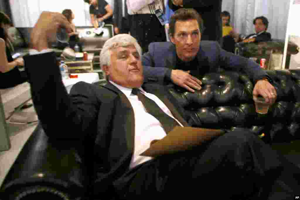 Jay Leno, left, and Matthew McConaughey pose in the green room at the 66th Primetime Emmy Awards at the Nokia Theatre L.A. Live, Los Angeles, Aug. 25, 2014.