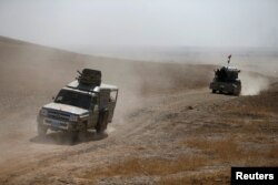 Peshmerga forces advance in the east of Mosul to attack Islamic State militants in Mosul, Iraq, Oct. 18, 2016.