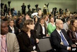 Members of the media ask questions to International Monetary Fund's Managing Director Dominique Strauss-Kahn.
