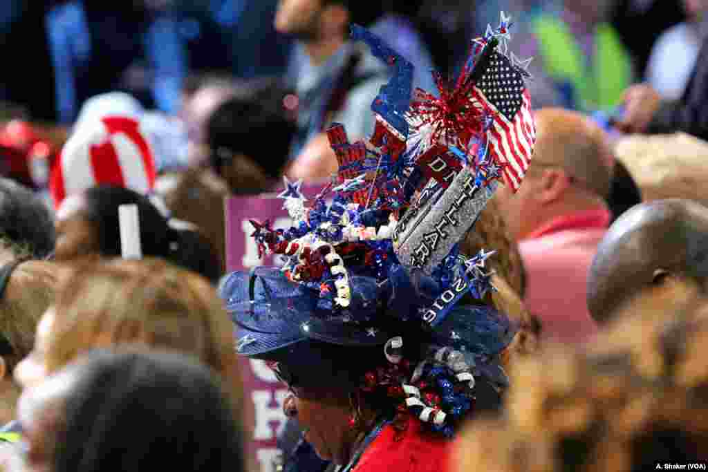 A convention attendee sports a unique hat at the Democratic National Convention in Philadelphia July 25, 2016 (A. Shaker/VOA)