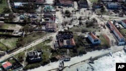 Kawasan permukiman warga di kota Pemba, Mozambik yang luluh lantak akibat dilanda topan Kenneth, 1 Mei 2019. 