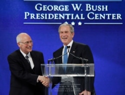 FILE - Former President George W. Bush, right, shakes hands with former Vice President Dick Cheney during the groundbreaking ceremony for the President George W. Bush Presidential Center in Dallas, Nov. 16, 2010.