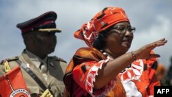 Malawi president Joyce Banda waves to the crowd gathered in Lilongwe for the official launch of her electoral presidential campaign, March 29, 2014 in Lilongwe. 