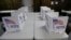 FILE - Voting booths await voters in Red Oak, Iowa, June 3, 2014, ahead of primary elections. 