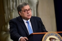 FILE - U.S. Attorney General William Barr speaks at the Justice Department in Washington, July 15, 2019.