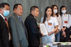 Rakchanok Srinok and members of Thai Unity Club, a group formed on Clubhouse, submitted a letter to bring attention to the condition of jailed political activists in March 2021. (Courtesy Thai Unity Club)