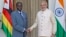 Zimbabwe's President Robert Mugabe, left, poses with Indian Prime Minister Narendra Modi, before a bilateral meeting on the sidelines of the India Africa Forum Summit, in New Delhi, India, Wednesday, Oct. 28, 2015. (AP Photo/ Manish Swarup)