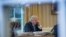 President Donald Trump speaks on the phone in the Oval Office at the White House in Washington, Jan. 28, 2017.