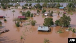 FILE - Widespread flooding is seen in the Buzi area of Mozambique after the landfall of Cyclone Eloise, in this video grab made from handout aerial video footage taken by UNICEF on Jan. 24, 2021.
