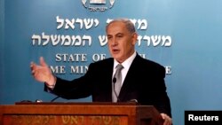 Israel's Prime Minister Benjamin Netanyahu speaks during a news conference at his office in Jerusalem, December 2, 2014.