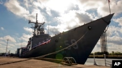 In this Sept. 18, 2015, photo released by the U.S. Navy, the guided-missile frigate USS Kauffman is honored at a decommissioning ceremony at Naval Station Norfolk in Norfolk, Va. (Shane A. Jackson/U.S. Navy via AP)