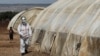 Setahun Pandemi: Virus Corona Tambah Beban di Timur Tengah 