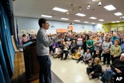 FILE - South Bend Mayor Pete Buttigieg speaks to a crowd about his Presidential run during the Democratic monthly breakfast held at the Circle of Friends Community Center in Greenville, S.C.