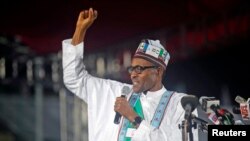 Presidential aspirant and former Nigerian military ruler Muhammadu Buhari speaks as he presents his manifesto at All Progressives Congress party convention in Lagos, Dec. 11, 2014.