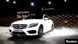 The new Mercedes-Benz 2015 C-Class is displayed during a private preview for media at the Westin Book Cadillac Hotel in Detroit, Michigan, Jan. 12, 2014, on the eve of the 2014 North American International Auto Show. 