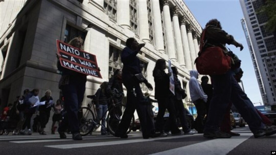 Dozens take part in a variety of protests leading up to this weekend's NATO summit in Chicago, May 16, 2012.