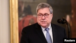 FILE - U.S. Attorney General William Barr at a presentation ceremony for Medal of Valor and heroic commendations to civilians and police officers who responded to shootings in Dayton, Ohio, and El Paso, Texas, Sept. 9, 2019, in Washington.