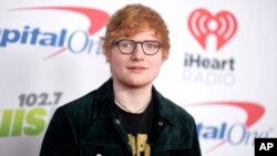 Ed Sheeran arrives at Jingle Ball at The Forum, Dec. 1, 2017, in Inglewood, California. 