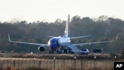 This Southwest Airlines plane was one of two searched at Hartsfield-Jackson Atlanta International Airport after bomb threats were received, Jan. 24, 2015.