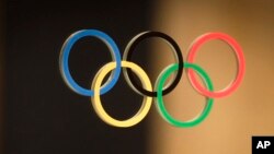 ዳደ ደስታን ማይክ ስዩምን ኣብ ምዕባለታት ኦሎምፒክስ ይዘራረቡ