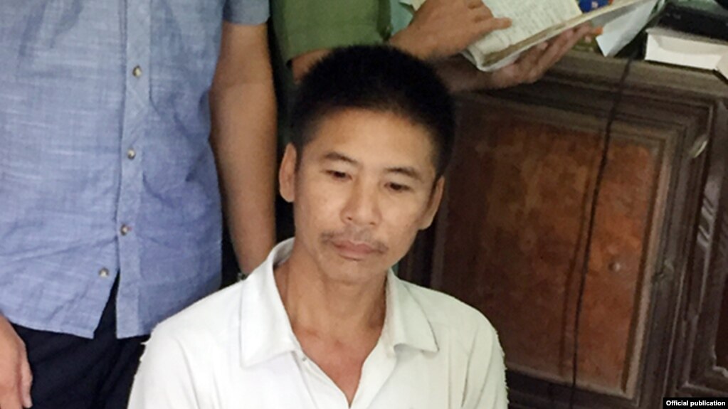 Ông Nguyễn Trung Trực khi bị bắt ngày 4/8/2017. (Ảnh: CAND)