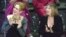 FILE - In this March 23, 2003, photo, actresses Meryl Streep, left, and Barbra Streisand applaud on stage during a reunion of past Oscar winners during the 75th Academy Awards in Los Angeles, California.