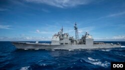 FILE - Guided-missile cruiser USS Antietam patrols in the U.S. 7th Fleet area of responsibility in support of stability and security in the Indo-Asia-Pacific region. (U.S. Navy photo by Mass Communication Specialists 3rd Class Bradley J. Gee/Released)