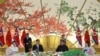 Xi Jinping (esq) e Kim Jong-Un em Pyongyang