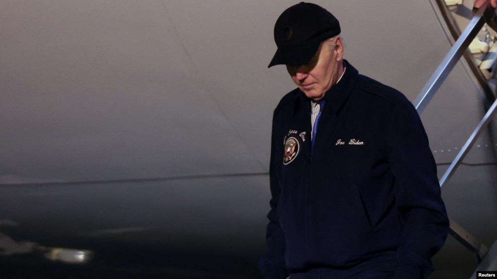U.S. President Joe Biden deboards Air Force One, at Dover Air Force Base in Dover