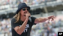 FILE - Singer Kid Rock performs a concert before the Daytona 500 auto race in Daytona Beach, Florida, Feb. 22, 2015. Rumors have been swirling about his political ambitions.