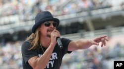 FILE - Singer Kid Rock performs a concert before the Daytona 500 auto race in Daytona Beach, Florida, Feb. 22, 2015. Rumors have been swirling about his political ambitions.