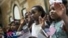 Children take the Oath of Allegiance as they become U.S. citizens during a citizenship ceremony at The Bronx Zoo, May 5, 2017, in The Bronx borough of New York City.