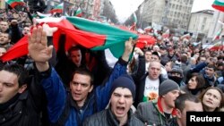 Thousands of demonstrators shout slogans protesting high utility bills and energy-sector monopolies, Sofia, Bulgaria, Feb. 24, 2013.