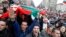 Thousands of demonstrators shout slogans protesting high utility bills and energy-sector monopolies, Sofia, Bulgaria, Feb. 24, 2013.