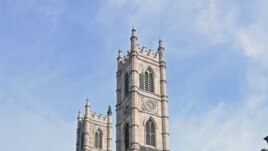Horse-drawn carriages line up in front of the Notre-Dame basilica in Old-Montreal, waiting for tourists in Montreal, Quebec, Canada on December 22, 2019. (Photo by Eric THOMAS / AFP)