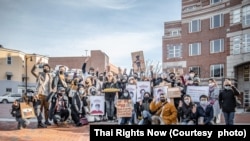 Thai political activists hold an activity calling for abolishment of lese majeste law at King Bhumibol Adulyadej of Thailand Square in Boston, Massachusetts on December 5, 2021