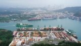 (FILE) An aerial view shows containers at the Balboa Port, operated by Panama Ports Company, at the Panama Canal, in Panama City, Panama, February 1, 2025.