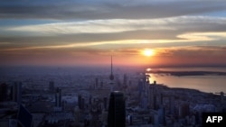 FILE - A view of Kuwait City at sunset. 