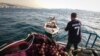 Fishermen head out to sea off the coast of Beirut. They say fish spawning grounds have been destroyed by the land reclamation.