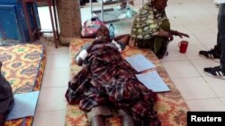 Survivors of an air strike by Ethiopian government forces receive treatment at the Shire Shul General hospital in the town of Dedebit, northern region of Tigray, Ethiopia Jan. 8, 2022. 