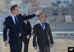 British Prime Minister David Cameron arrives at the St. Angelo Fort in the Three cities, during the CHOGM Commonwealth Heads of Government Meeting in, Malta, Nov. 28, 2015.