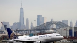 FILE - A United Airlines passenger jet takes off with New York City as a backdrop. Airline stocks sank Nov. 26, 2021, in response to news that a new COVID variant had been detected. United shares fell 9.6%, and American Airlines shares fell 8.8%.