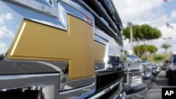 FILE - The Chevrolet logo is displayed at Miami Lakes AutoMall in Miami Lakes, Fla., Oct. 1, 2014. 