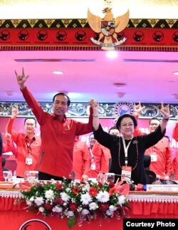 Ketua Umum PDI Perjuangan Megawati Soekarnoputri mengumumkan penetapan Joko Widodo sebagai calon presiden 2019-2024 di Rakernas PDI P Bali Jumat 23 Februari 2018. (Foto courtesy: Biro Pers Istana)