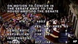 In this photo rendered from video via C-SPAN, shows the final vote tally on the bill to avoid income tax increases on Jan. 1