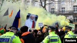 British Sikhs gather to protest against India's new farming legislation, outside the High Commission of India in London, Britain, Dec. 6, 2020. 